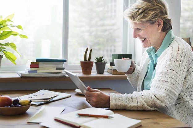 Senior-Adult-using-Digital-Tablet